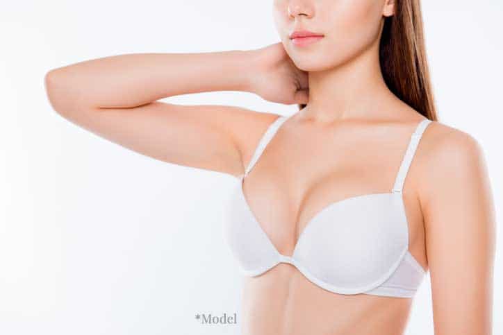 Model with small breasts after a breast reduction
