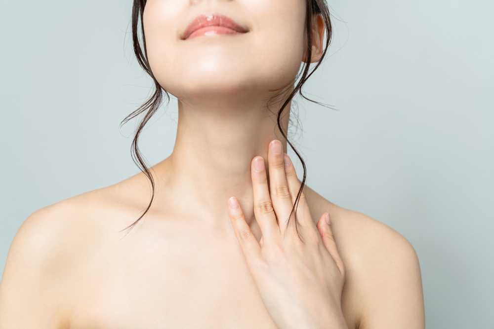 Close up of woman's chin and neck that looks defined after chin augmentation in San Antonio